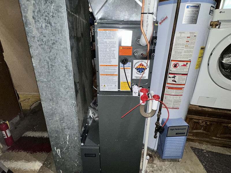 Furnace and water heater during a service call — Murray, Utah