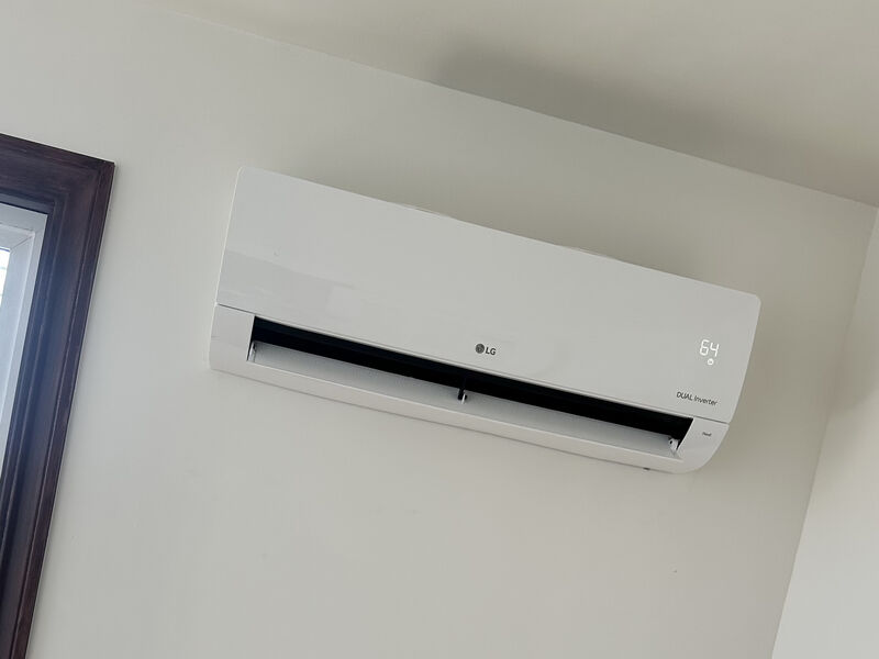 LG ductless mini-split head mounted on an interior wall